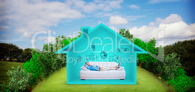 Composite image of side view of man resting on sofa