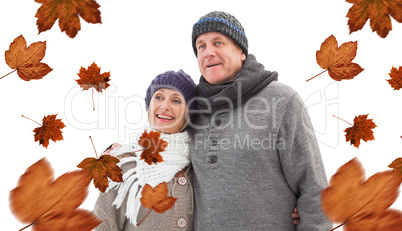 Composite image of mature winter couple