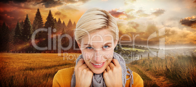 Composite image of smiling woman wearing a scarf