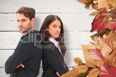 Composite image of unhappy couple not speaking to each other