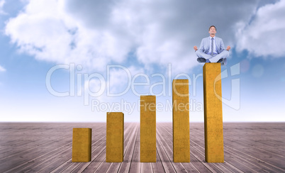 Composite image of calm businessman meditating in lotus pose