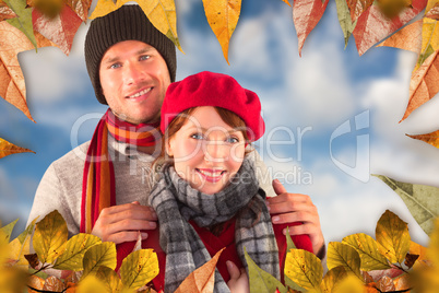 Composite image of couple smiling at the camera