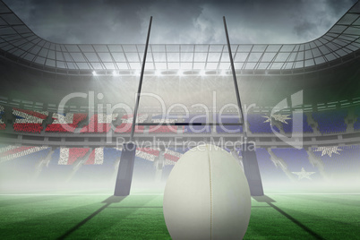 Composite image of close-up of rugby ball