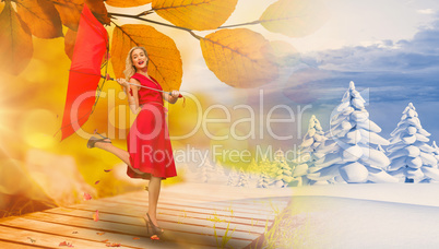 Composite image of elegant blonde holding umbrella