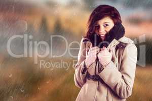 Composite image of portrait of beautiful woman in winter coat