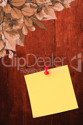 Composite image of illustrative image of pushpin on yellow paper