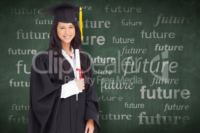 Composite image of a smiling woman holding her degree as she has