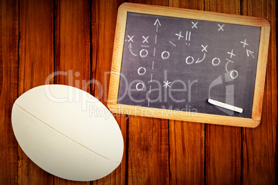 Composite image of close-up of rugby ball