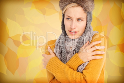 Composite image of attractive blonde wearing a warm hat