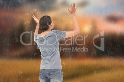 Composite image of pretty brunette gesturing