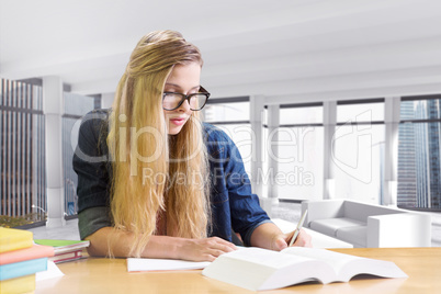 Composite image of student studying in the library