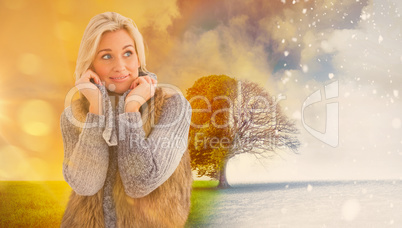 Composite image of blonde in winter clothes smiling