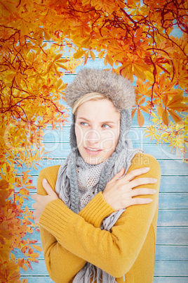 Composite image of attractive blonde wearing a warm hat