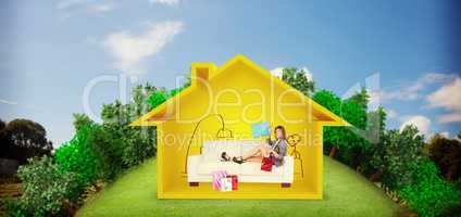 Composite image of woman lying on couch with shopping bags