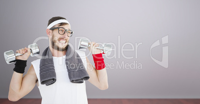 Composite image of geeky hipster lifting dumbbells in sportswear