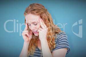 Composite image of upset blonde woman suffering from headache