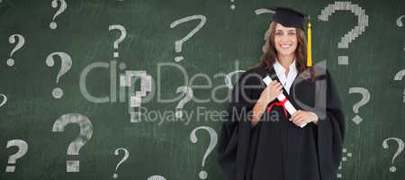 Composite image of full length shot of a graduate holding a degr