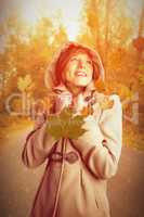 Composite image of smiling beautiful woman in winter coat lookin
