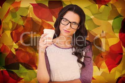 Composite image of brunette with mug