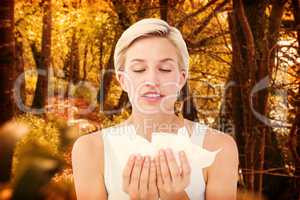 Composite image of sick woman holding tissues