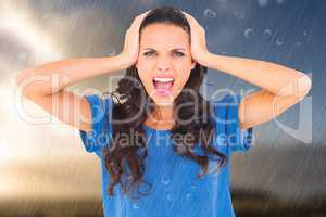 Composite image of angry brunette shouting at camera