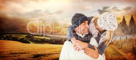 Composite image of happy cute couple romancing while embracing e