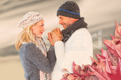 Composite image of cute smiling couple holding hands