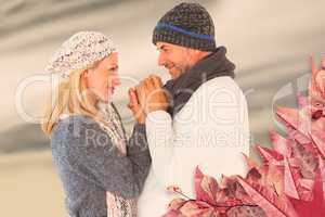 Composite image of cute smiling couple holding hands