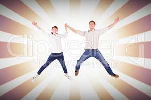 Composite image of couple jumping and holding hands