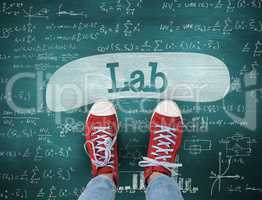 Lab against green chalkboard