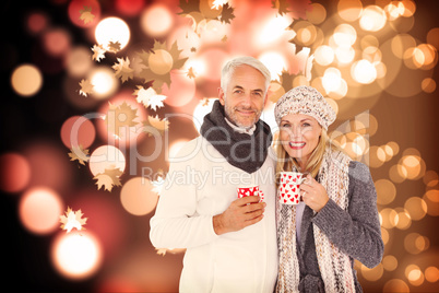 Composite image of portrait of happy couple drinking hot coffee