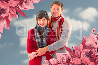 Composite image of couple holding and smiling together