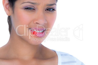 Composite image of portrait of beautiful woman biting lips