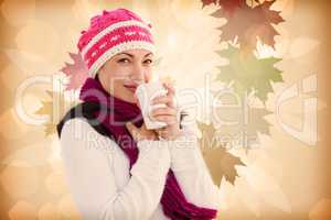 Composite image of woman holding coffee cup