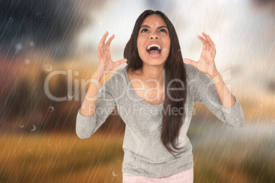 Composite image of angry brunette shouting