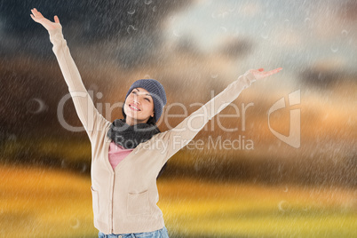 Composite image of smiling brunette standing arms open