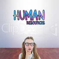 Composite image of female geeky hipster looking confused