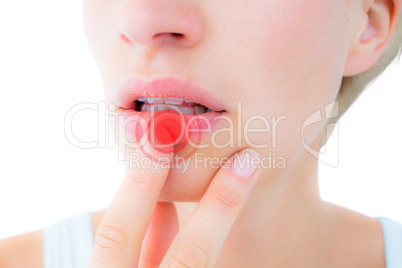 Composite image of thoughtful woman touching her lips