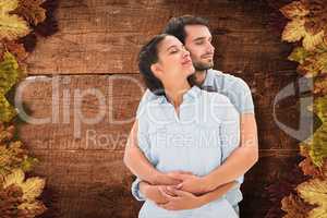 Composite image of cute couple embracing with eyes closed