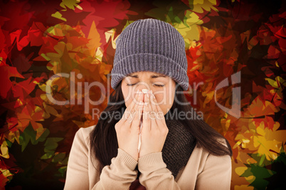 Composite image of sick brunette blowing her nose