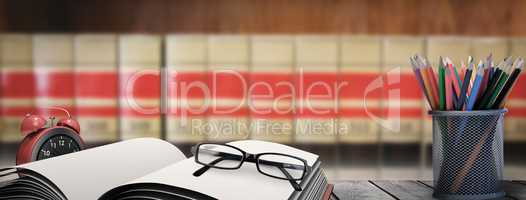 Composite image of school supplies on desk