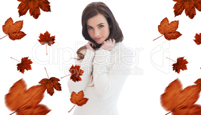 Composite image of brunette in white jumper smiling at camera
