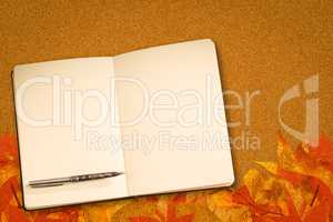 Composite image of notebook and pen