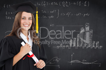 Composite image of a smiling woman with a degree in hand as she