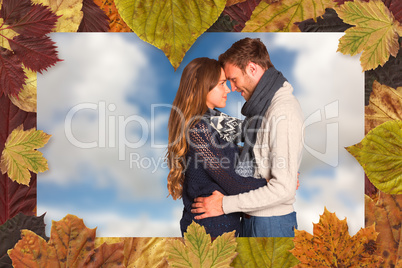 Composite image of side view of young couple embracing