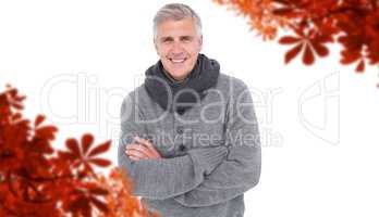 Composite image of casual man in warm clothing