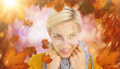 Composite image of smiling woman wearing a scarf