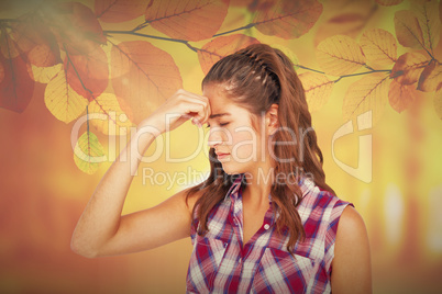 Composite image of a pretty brunette with headache Composite image of a pretty brunette with headache
