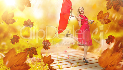 Composite image of elegant blonde holding umbrella