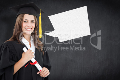 Composite image of a smiling woman with a degree in hand as she